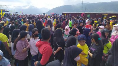 Semarak HUT ke-77 RI, Ribuan Masyarakat Antusias Ikut Jalan Santai Partai Golkar Morut