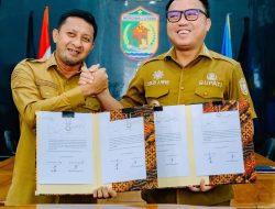 Bupati Morowali Utara dan Bupati Touna Tandatangani Tapal Batas Kedua Kabupaten